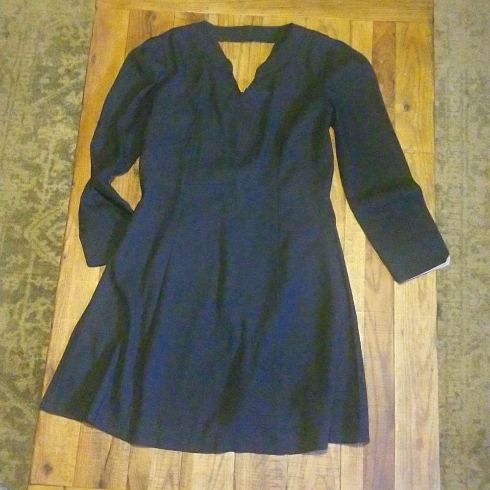 Flirty black dress with contrast cuffs